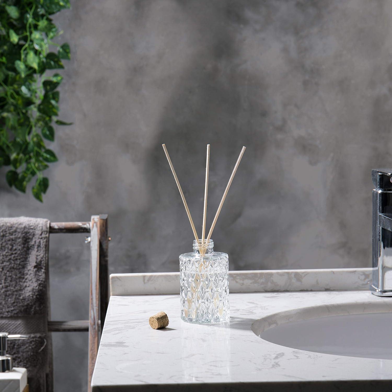 imageMyGift Small Clear Glass Reed Diffuser Bottles Vintage Embossed Apothecary Style Flower Bud Vases with Cork Lids Set of 2Clear Set of 2