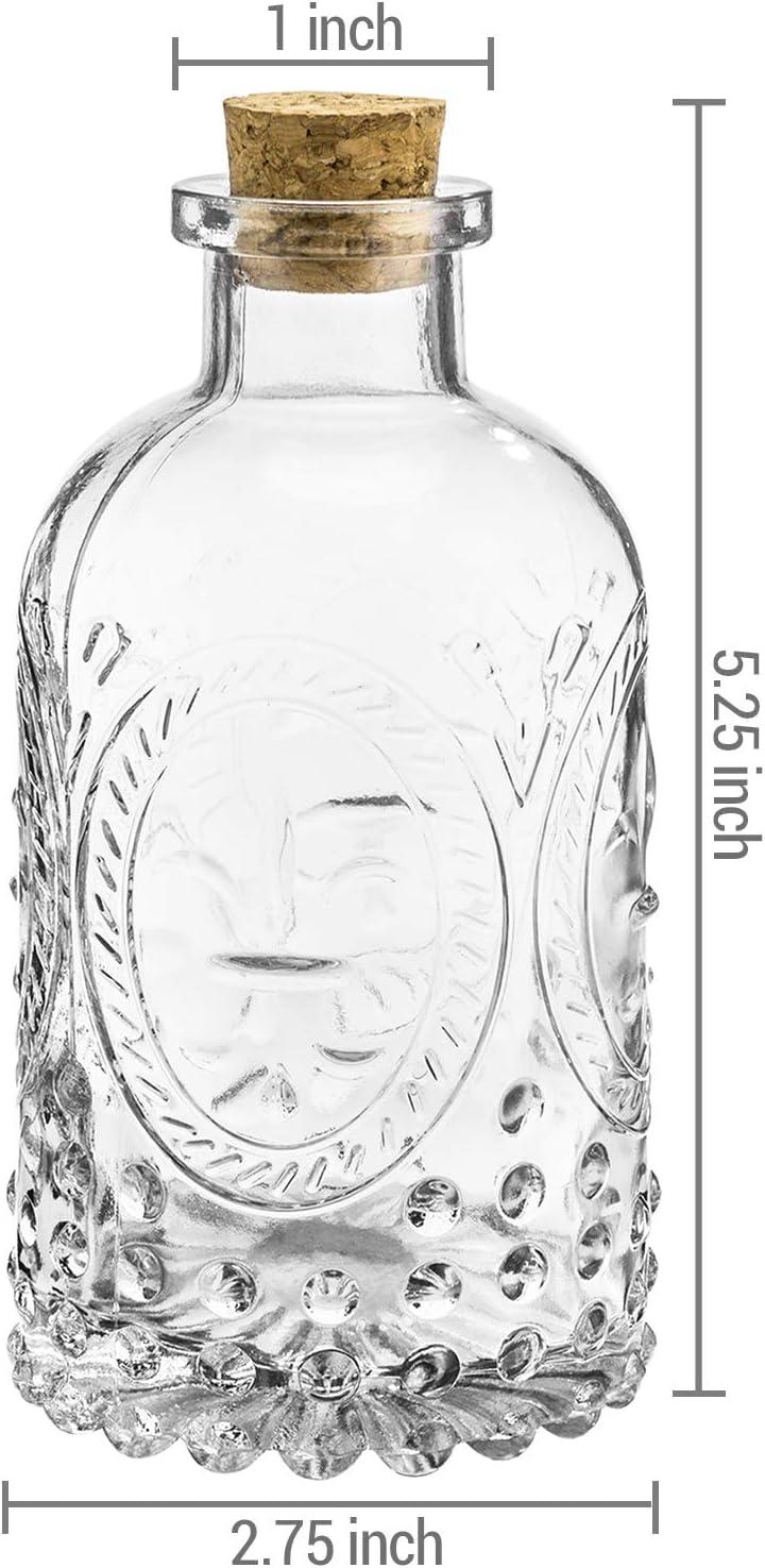 imageMyGift Small Clear Glass Reed Diffuser Bottles Vintage Embossed Apothecary Style Flower Bud Vases with Cork Lids Set of 2Vintage Clear Glass Set of 6